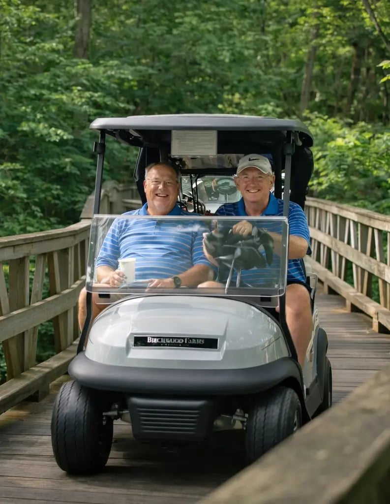 GOLFERS - Driving Cart Across Bridge